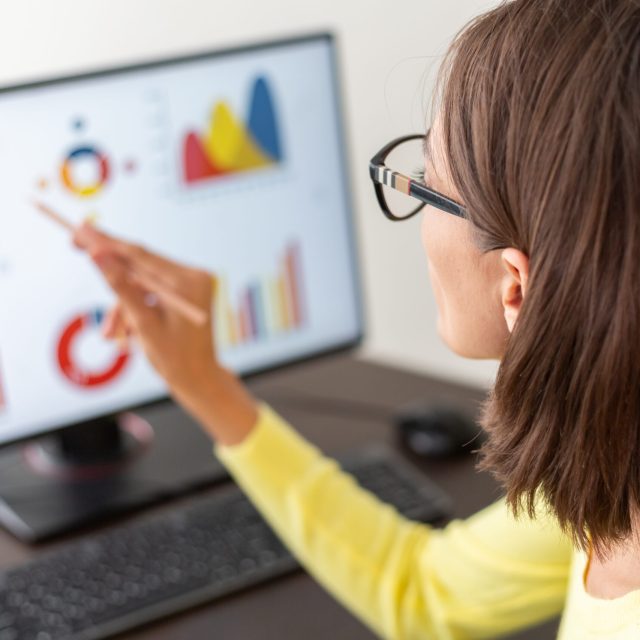 Caucasian advisor financial business analytics woman with data dashboard graphs Caucasian advisor financial business analytics woman with data dashboard graphs